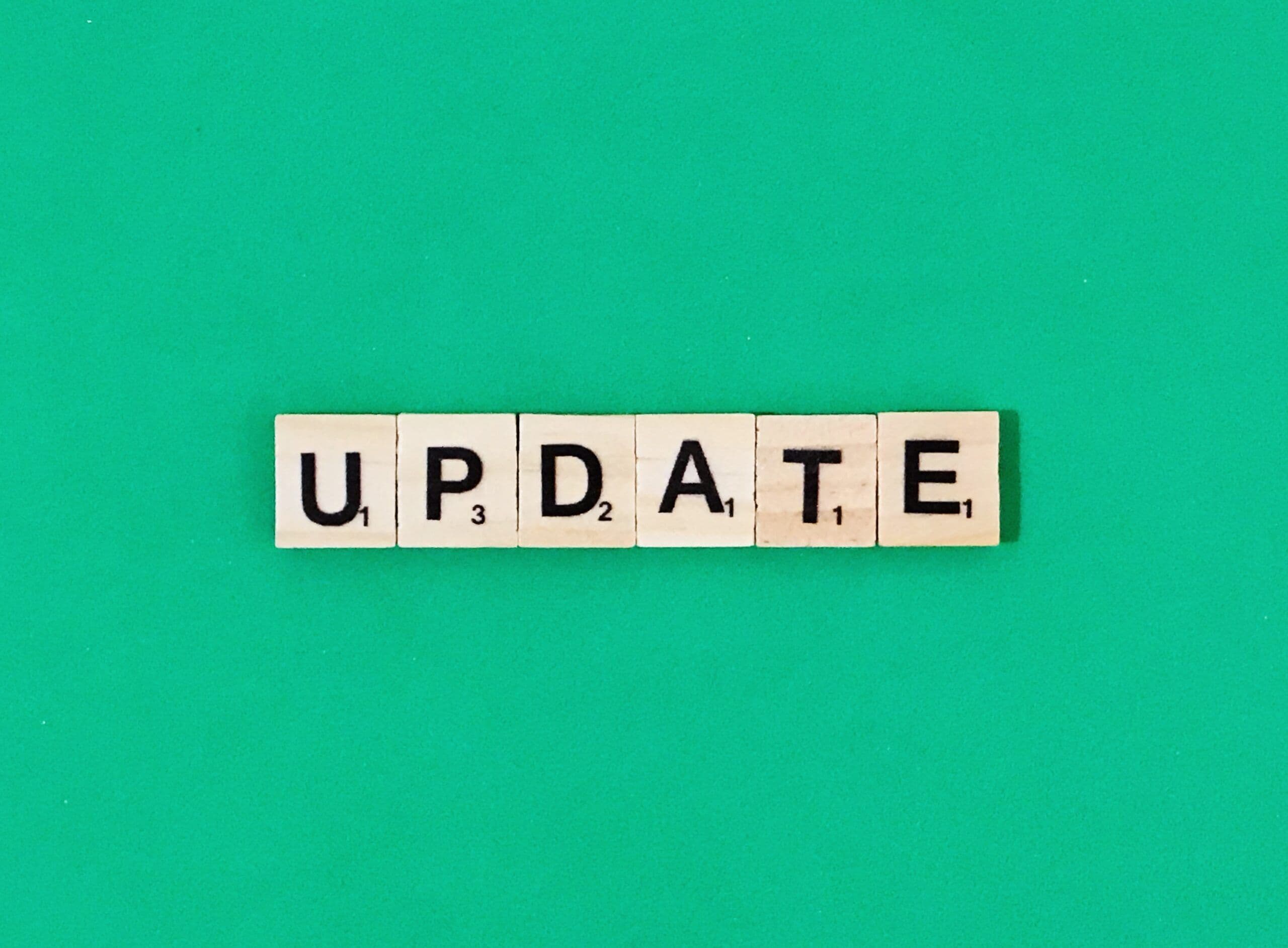 A stock image of wooden Scrabble tiles that spell UPDATE