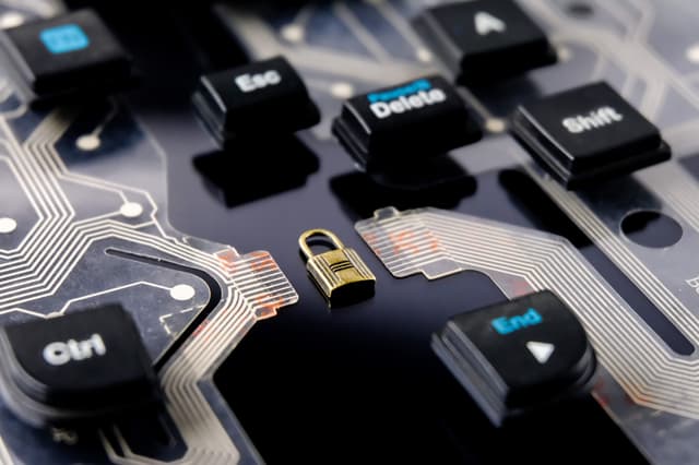 A stock image of a lock on an exploded view of a keyboard
