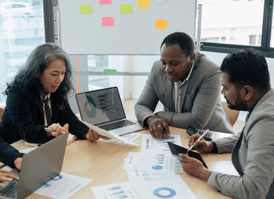 Financial professionals working in a modern office