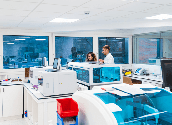 A team of laboratory technicians are working in a modern laboratory